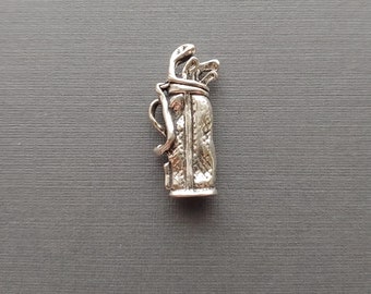 Limited edition sterling silver golf bag with clubs charm measuring 25mmx10mm. Weight of charm is 4.32 grams.