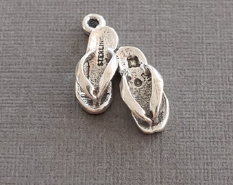 Limited edition sterling silver Flip Flop Shoe charm measuring 12x6mm. Weight of charm is 1.2 grams.