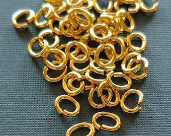 SNAPEEZ® "The Snapping Jump Ring" 24 kt. Gold Oval Jump Ring Hard Open Locking Jump Ring 6x4mm Heavy Gauge. Made in USA.
