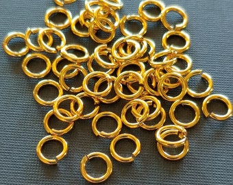 SNAPEEZ® The Ultra Secure No Solder Jump Ring 24 kt. Gold Ring Hard Open Locking Snapping Jump Ring 6mm Heavy Gauge. Made in USA.