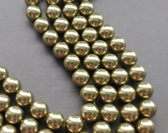 Swarovski 5810 Crystal 8mm Round Light Green Pearl Beads for Jewelry Stringing and Knotting Jewelry. Sold 50 beads per strand.