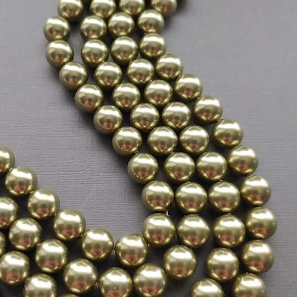 Swarovski 5810 Crystal 8mm Round Light Green Pearl Beads for Jewelry Stringing and Knotting Jewelry. Sold 50 beads per strand.