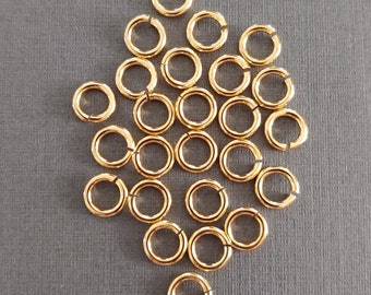 SNAPEEZ® "The Snapping Jump Ring" 24 kt. Gold Ring Hard Open Locking Jump Ring 7mm Heavy Gauge. Made in USA.