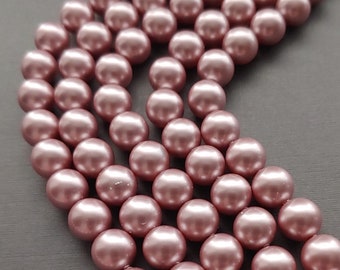 Swarovski 5810 Crystal 8mm Round Powder Rose Pearl Beads for Jewelry Stringing and Knotting Jewelry. Sold 50 beads per strand.