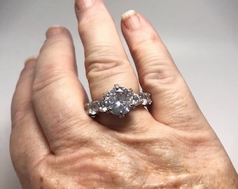Stunning All-around CZ Sterling Silver Rhodium Plated Ring Sz10