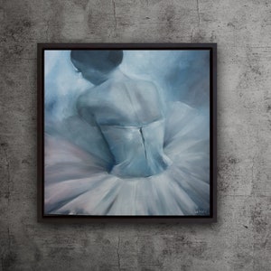 May include: A painting of a ballerina in a white tutu, with a blue background. The ballerina is facing away from the viewer, and her back is turned. The painting is in a black frame.