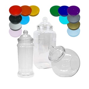 May include: Three clear plastic jars with lids, a square jar, a round jar, and a tall cylindrical jar. The jars are arranged on a white background. A variety of coloured lids are shown above the jars.