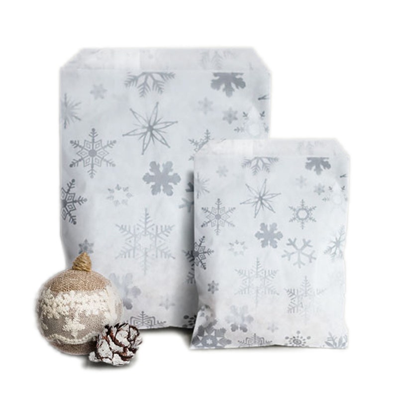 100 Christmas Paper Bags Smiling Santa, Iconic, Snowflake Festive