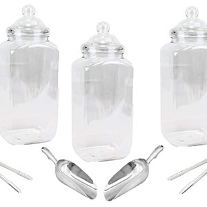 May include: Three clear plastic jars with lids, two silver serving scoops, and a pair of silver tongs. The jars are tall and rectangular.