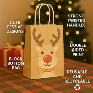 May include: A brown paper gift bag with a reindeer design, featuring a red nose and antlers. The bag has white twisted handles and the text "CUTE FESTIVE DESIGNS", "STRONG TWISTED HANDLES", "DOUBLE SIDED PRINT", "BLOCK BOTTOM BAG", and "REUSABLE AND RECYCLABLE".