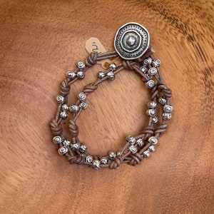 Hand knotted brown leather and silver wrap bracelet