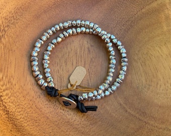 Silver and leather wrap style bracelet