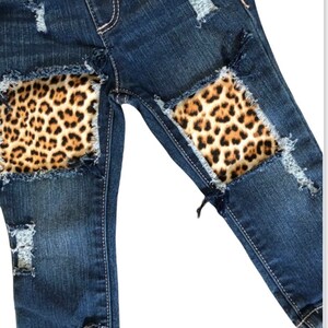 Distressed Black and Cheetah Animal Print Jeans with Feathered Seams – Être  Chic Boutique