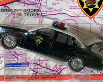 1996 FORD CROWN VICTORIA Diecast Police Cruiser...1/43 Scale, Made By Road Champs, Wyoming Highway Patrol
