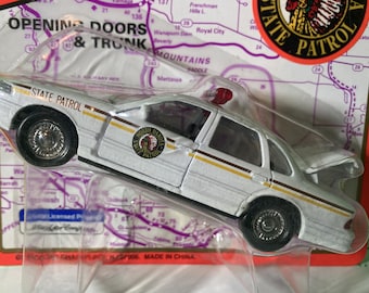 1995 FORD CROWN VICTORIA Diecast Police Cruiser...1/43 Scale, Made By Road Champs, North Dakota State Police