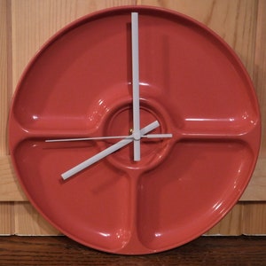 May include: A set of three ceramic mugs with a speckled, matte finish. The mugs are in shades of cream, light gray, and dark gray. Each mug has a simple, minimalist design, perfect for coffee or tea.