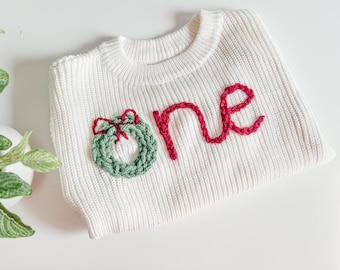 Embroidered First Birthday Sweater: Christmas Wreath, Red Number One