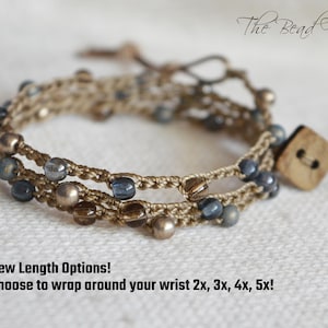May include: A wrap bracelet with a tan cord, adorned with blue and silver beads. A wooden square button secures the bracelet. The text "The Bead Farm" is in the upper right corner. The text "New Length Options! Choose to wrap around your wrist 2x, 3x, 4x, 5x!" is at the bottom.