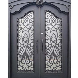 May include: Double iron entry doors with a decorative lion head design at the top and a scrolled pattern on the glass panels.