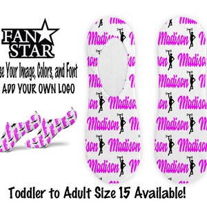 May include: White no-show socks with a repeating pattern of the name "Madison" in pink script and a black silhouette of a baton twirler. The socks are displayed with the text "FAN STAR" and "Choose Your Image, Colors, and Font OR ADD YOUR OWN LOGO".