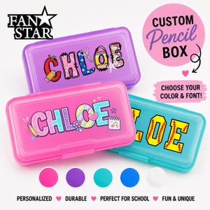 May include: Three rectangular plastic pencil boxes in purple, pink, and teal. The purple box features the name CHLOE in patterned letters. The pink box displays CHLOE with school-themed graphics. The teal box shows LOE in yellow baseball-style text.