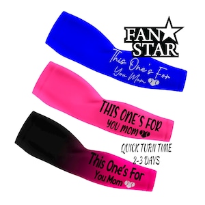 May include: Three arm sleeves in blue, pink, and black, each with the text "This One's For You Mom" and a tennis ball graphic. The top right corner has the text "FAN STAR".