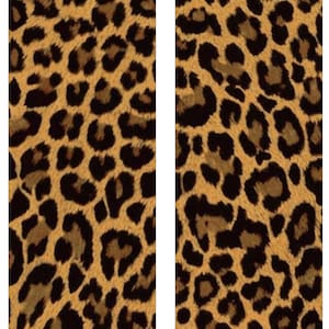 May include: A pair of socks featuring a leopard print pattern. The socks have a black band at the top and a tan and brown spotted design throughout the rest of the sock. The socks are made of a soft, comfortable material.