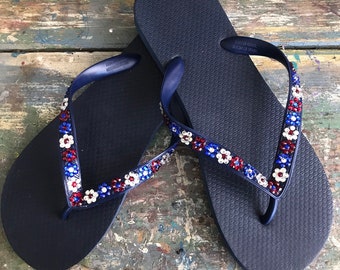 navy blue flip flops with bling