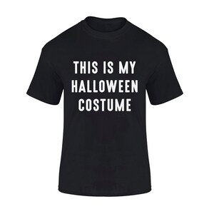 May include: Black t-shirt with white text that reads "This is my Halloween costume."