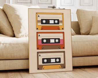 May include: A retro-style print featuring three stacked cassette tapes with the letter "A" on each. The tapes are in shades of orange, brown, and yellow.