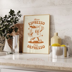 May include: A beige poster with a brown cartoon coffee cup with a face and arms. The text on the poster reads "More Espresso Less Depresso".