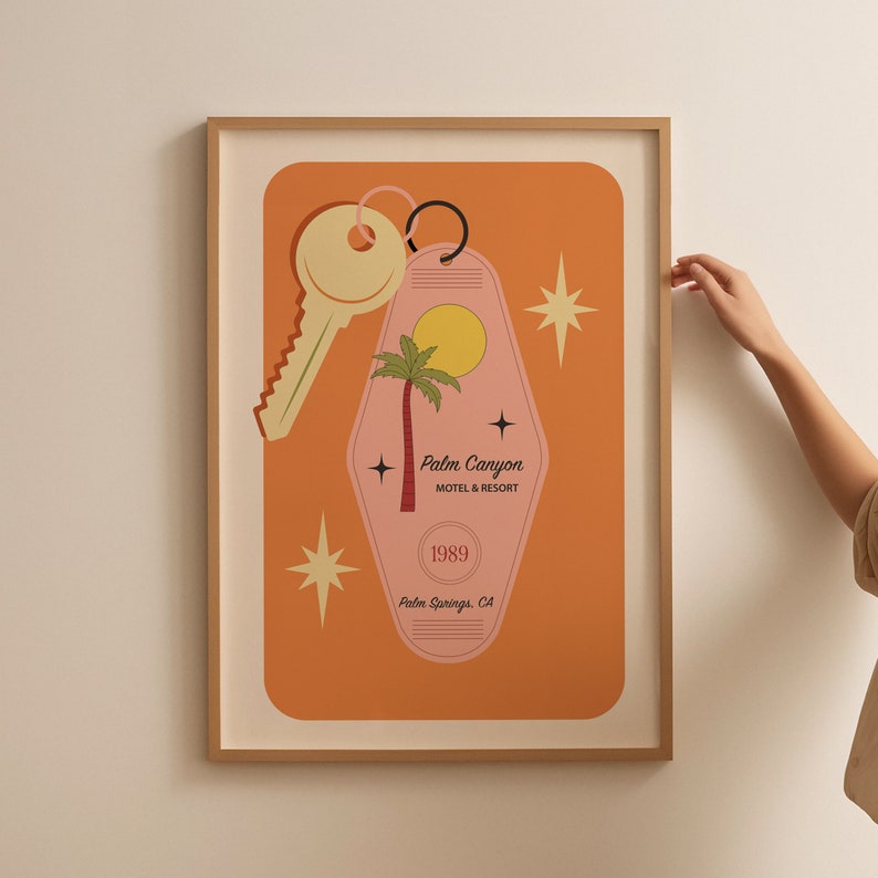 May include: A vintage-style motel key tag with a pink background and a palm tree illustration. The tag reads "Palm Canyon Motel & Resort" and "1989 Palm Springs, CA".