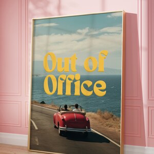 May include: A vintage red convertible car drives down a winding road with a blue ocean and sky in the background. The car has two people in the front seats. The text "Out of Office" is written in yellow letters on the image.