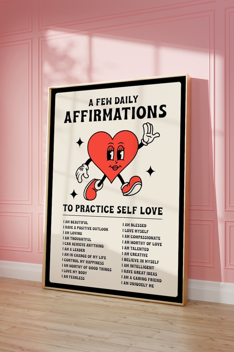 May include: A framed poster with a cream background features the text "A Few Daily Affirmations" and "To Practice Self Love." A cartoon heart with arms and legs is in the center. The poster lists positive affirmations.