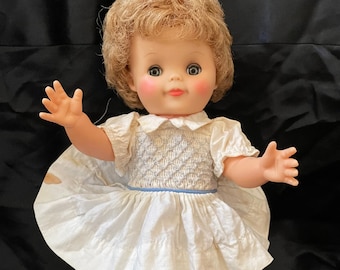 Vintage 11” Fluffy Doll wearing dress and underwear