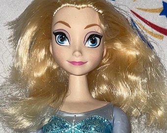 ICE SKATING ELSA Barbie Doll with long beautiful hair - see video of her skating and arms moving