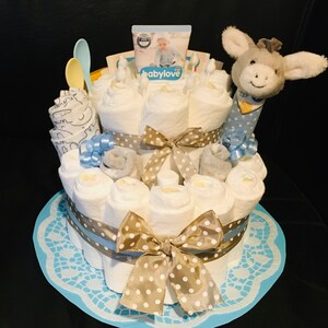 Windeltorte mit Stabgreifling und viel Zubehör zur Geburt, Taufe, Babyparty