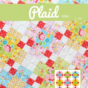 May include: A colorful quilt pattern called "Plaid Mini #106" designed by Nadra Ridgeway. The quilt is made of small squares of fabric in various floral prints and solid colors, including red, pink, yellow, green, and blue. The quilt is 20 inches by 20 inches.