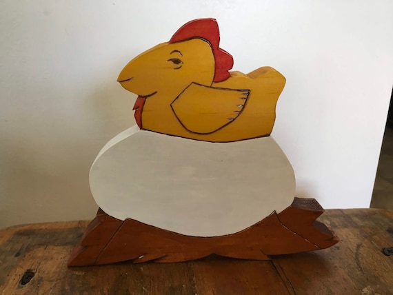 wooden chicken and egg plaque