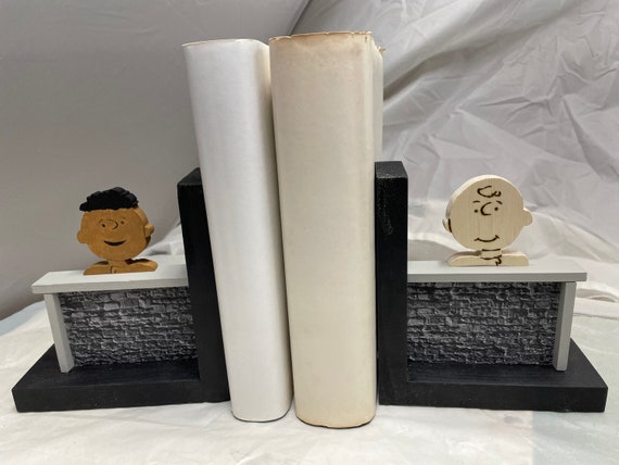 Wooden “stonewall” bookend with friends Franklin and Charlie Brown.