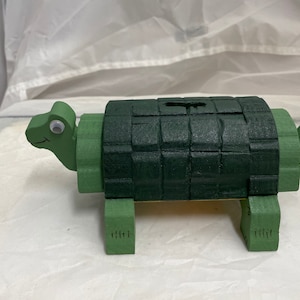 Wooden turtle coin bank (with &quot;hidden&quot; coin access)