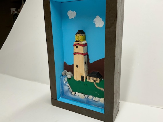 Wooden Shadow Box of a Lighthouse on the Coast