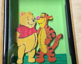 Wooden shadow box of buddies Winnie and Tigger