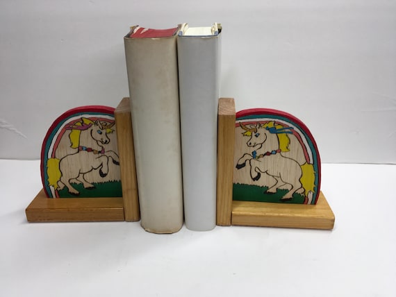 Wooden bookend with colorful ponies - female and male