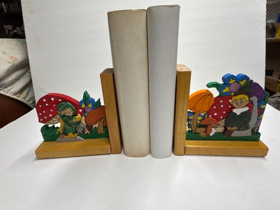 Wooden bookend with elf, fairy, and mushrooms