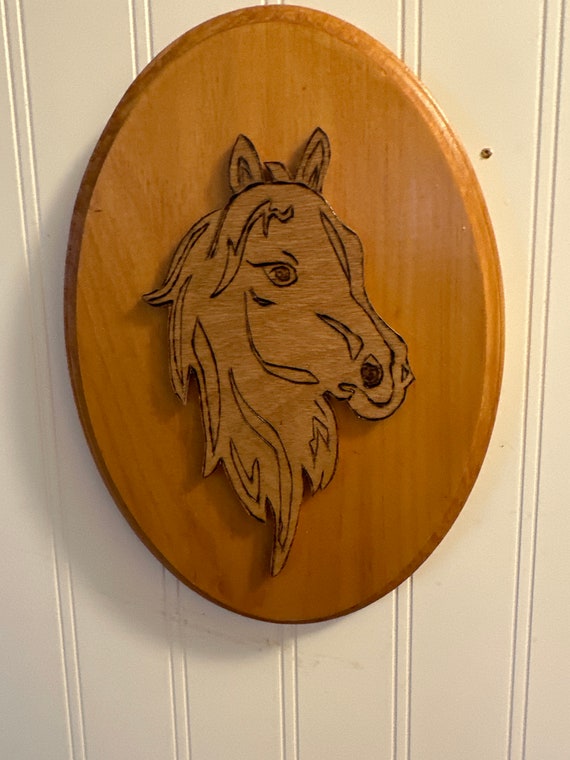 Wooden plaque of a Horse’s head