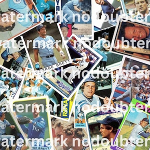 May include: A collage of vintage baseball cards featuring George Brett of the Kansas City Royals. The cards display action shots and portraits, with the team's blue and white colors prominent. Some cards have text like "Royals" and "GEORGE BRETT".