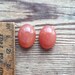 Pair of orange moonstone oval cabochons 20.75ct