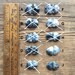Little pairs of dendritic agate freeform rosecut cabochons, merlinite