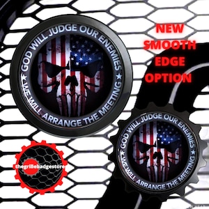 May include: Black and red skull with an American flag design on a black round emblem with the text "God will judge our enemies we will arrange the meeting".